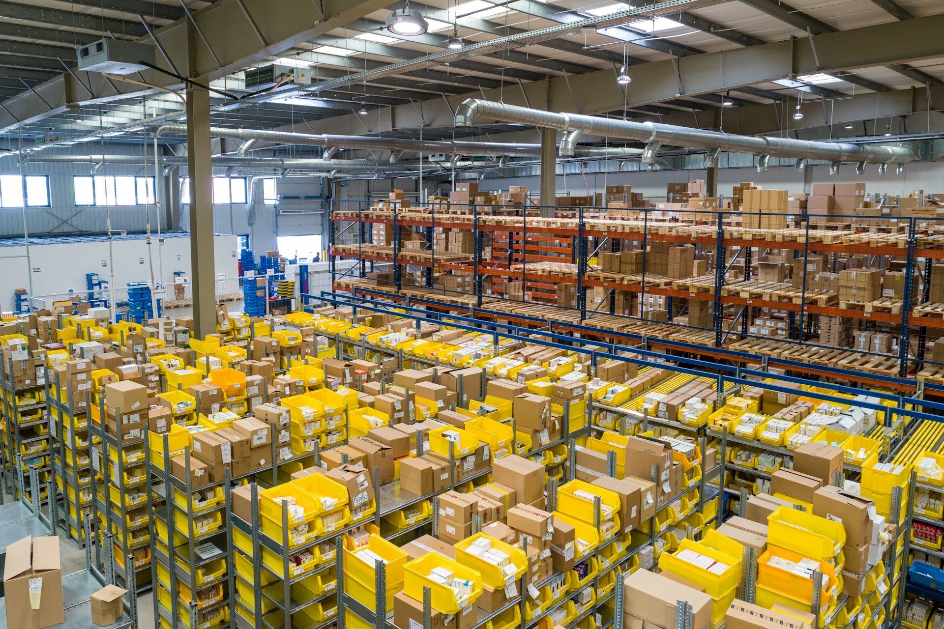 Organized warehouse with shelves of boxed goods